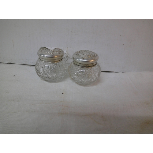 146 - Two small glass pots with silver lids each 4cmH