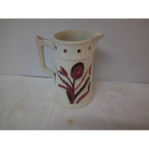 135 - Coloured pottery jug 22cmH