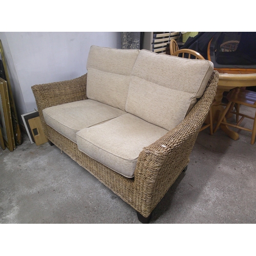 198 - Wicker two seater settee with loose cushions