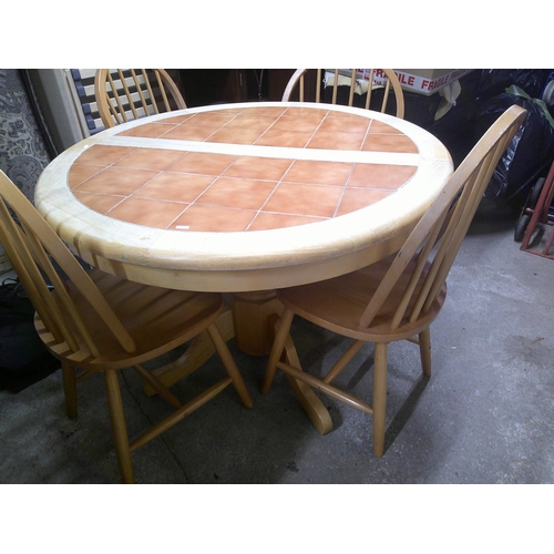 199 - Circular, tiled top dining table & four chairs