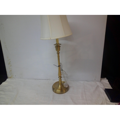 38 - A tall brass table lamp 83cmH