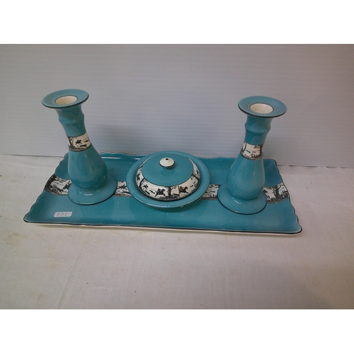 86 - Four piece pottery dressing table set, candlesticks 16cmH