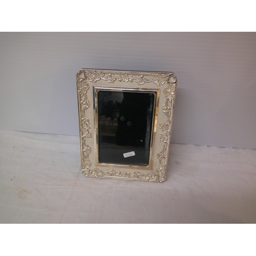 87 - Decorative silver plated photo frame 25cm X 20cm