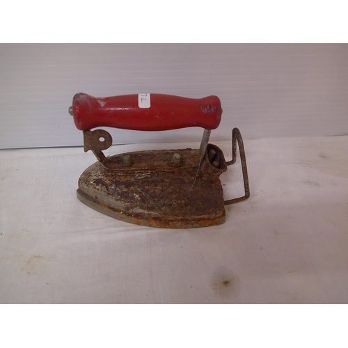 99 - A vintage smoothing iron 19cm X 12cm