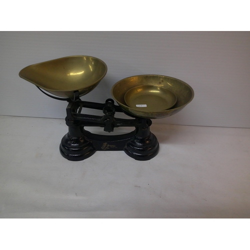 143 - Weighing scales with brass pans