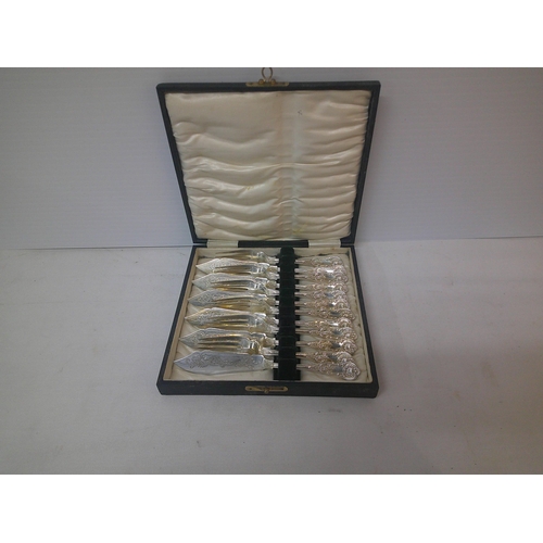 185 - Boxed set of six silver plated fish knives & forks