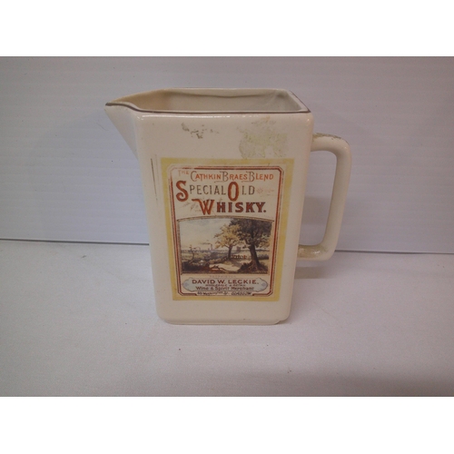 28 - Whisky pub jug 15cmH