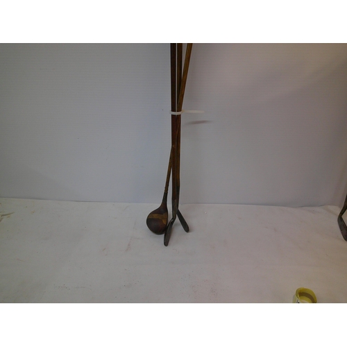 282 - Three vintage hickory shaft golf clubs
