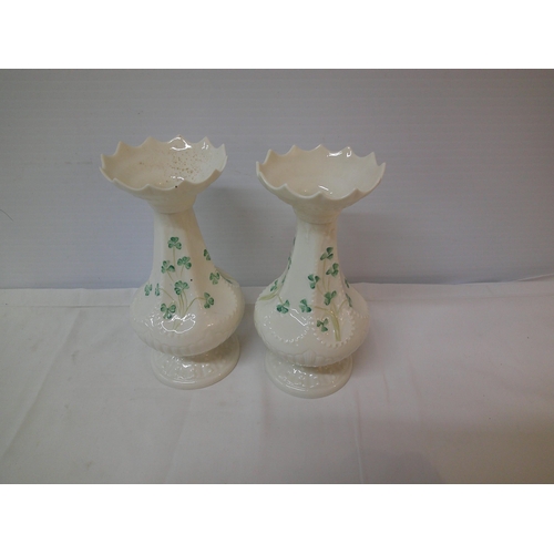 14 - Pair of Belleek shamrock pattern vases each 21cmH