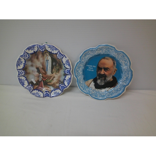 12 - Two religious plaques each 27cmD