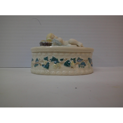 138 - An usual Belleek jewellery box 12cmW X 8cmH