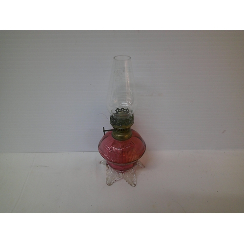 180 - A ruby glass lamp - 27cmH