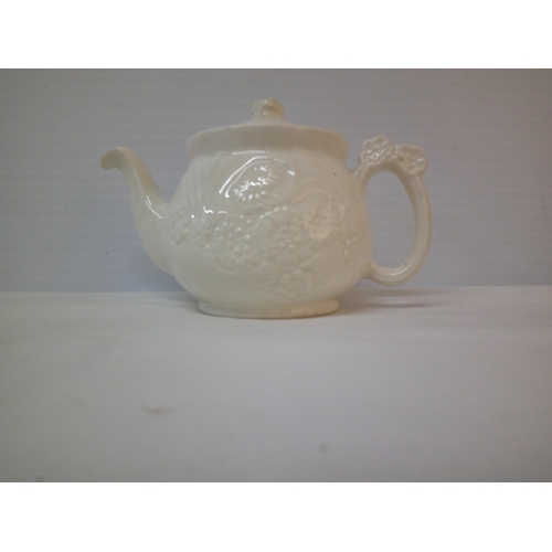 268 - A small white pottery tea pot - 18cmW x 12cmH