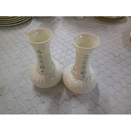 287 - A pair of Belleek shamrock pattern vases - 13cmH each