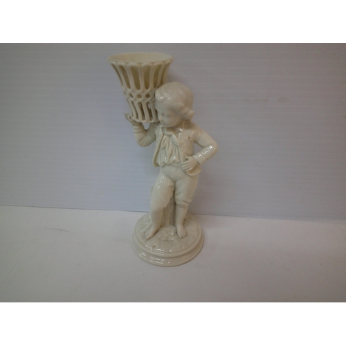 312 - A Belleek 1st period boy carrying a basket - 21.5cmH