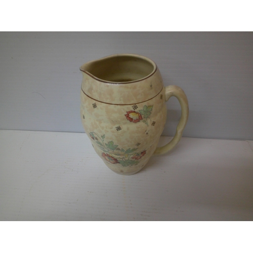 220 - An Arthur Wood pottery jug - 22cmH