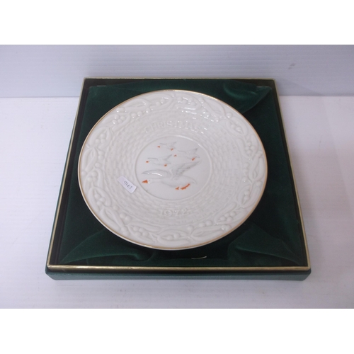 394 - A 6th period Belleek Christmas plate depicting Swans in flight 1972 22cmD