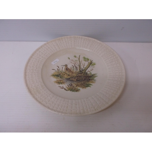 401 - A 6th period Belleek wildlife plate depicting a pair of Woodcock