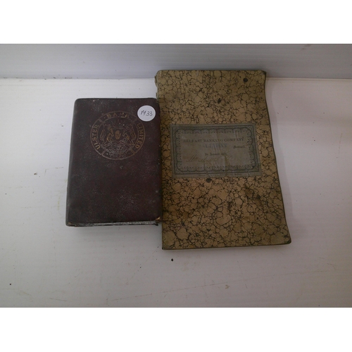 154 - An Ulster Bank money box and Belfast Banking Company pass book