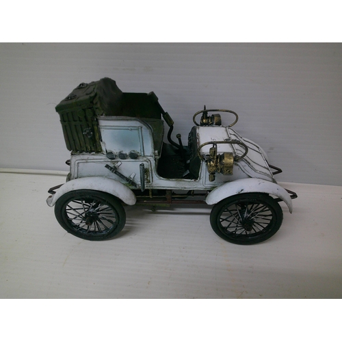 195 - A model vintage car - 28cmW x 17cmH