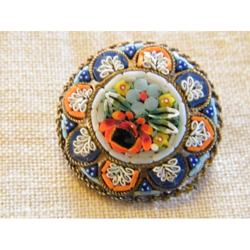 206 - A round micro mosaic brooch