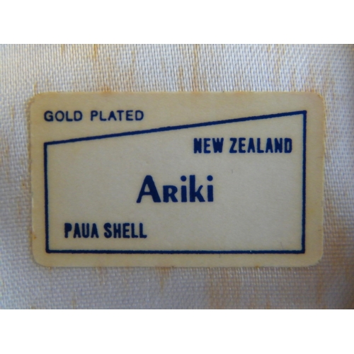 218 - An Ariki gold plated brooch with Paua shell