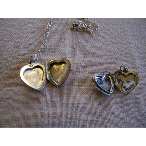 220 - A 925 silver locket on chain and another 925 silver locket