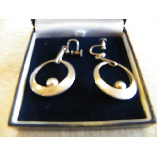 225 - A pair of modernist silver circle and sphere screw back earrings signed N E from Denmark