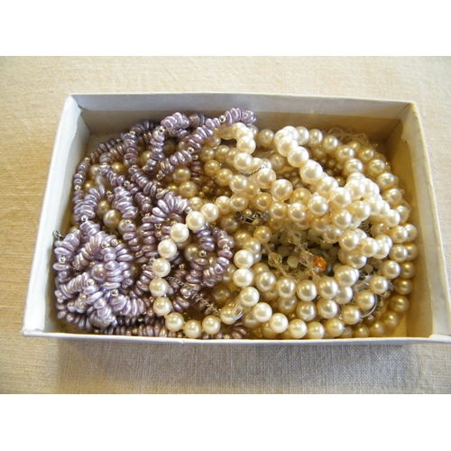 228 - A box of assorted pearl necklaces