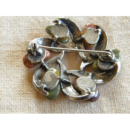 236 - A white metal and agate brooch