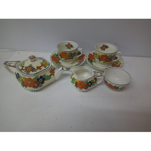 292 - W.H.Grindley & Co. Sheraton Ivory coloured tea pot, two cup and saucers, milk jug & sugar bowl.