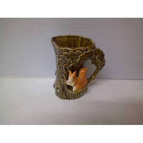 312 - A Sylvac pottery vase and squirrel - 15.5cmH