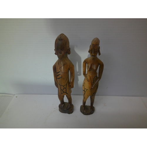 33 - Two wooden African figures - 33cm