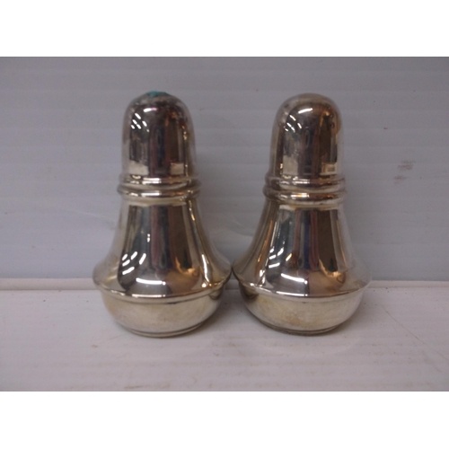 391 - A silver plated salt & pepper each 9cmH