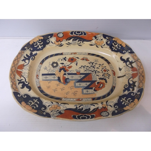 403 - An Oriental platter, repaired 41cmW