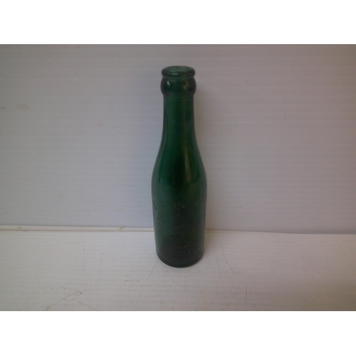 253 - A green glass bottle Downes & Sons, Ennis - 19.5cmH