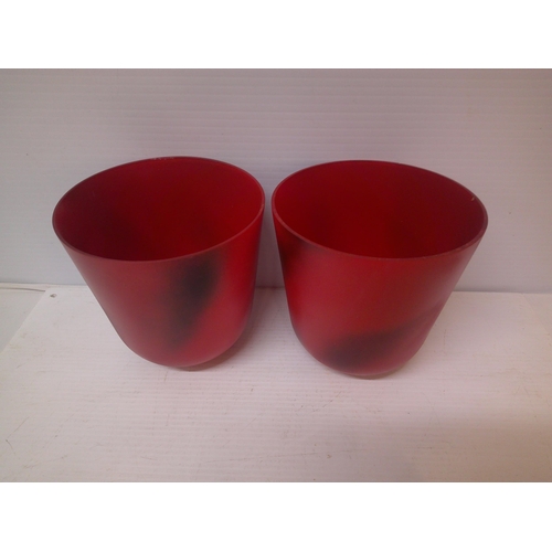 256 - Two red glass lampshades - 20cm each