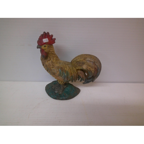 259 - A cast iron cockerel door stop - 21cmH x 18cmW