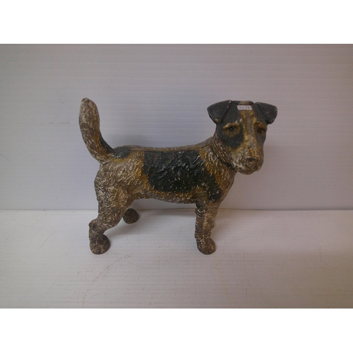 261 - A cast iron dog - 21cmH x 19cmW