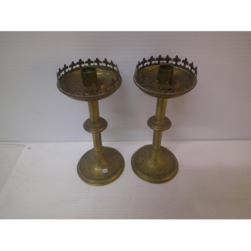 264 - A pair of brass candle holders - 25cmH each