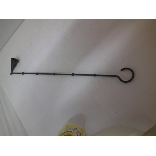 270 - A long metal candle snuffer - 50cm