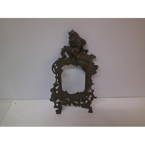 273 - An ornate metal picture frame - 35cmH