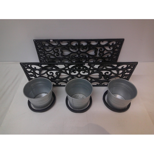 274 - Two wrought iron plant holders and three galvanised pots