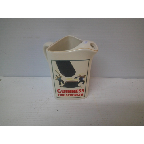 278 - A Guinness pub jug - 18cmH