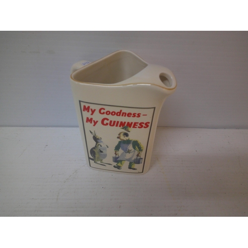 282 - A Guinness pub jug - 18cmH