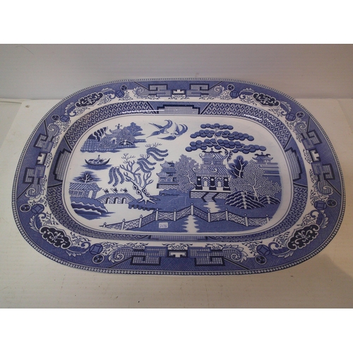 285 - A willow pattern platter - 47cm x 35cm