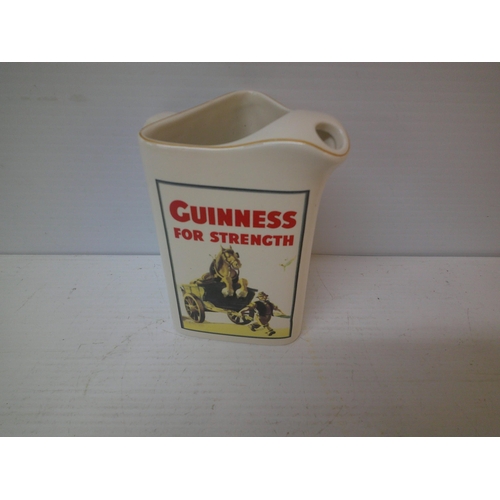 287 - A Guinness pub jug - 18cmH
