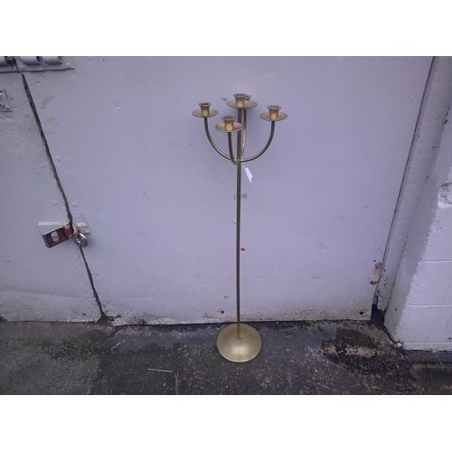 294 - A tall five branch brass candelabra - 104cmH