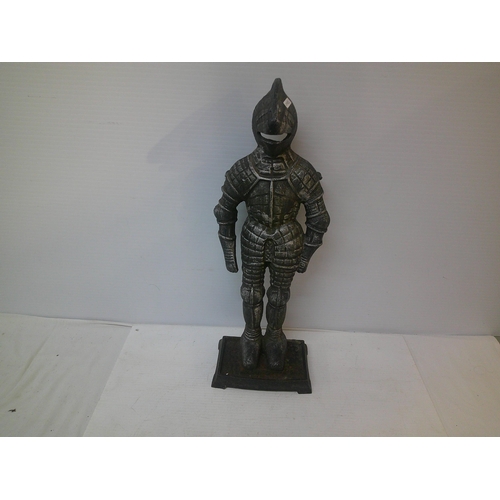 297 - A tall metal figurine, fire irons holder - 55cmH