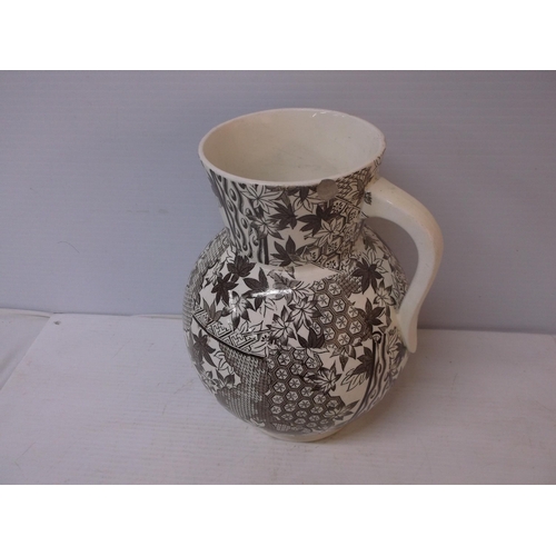 397 - An Oriental Ivory pottery jug, damaged 29cmH